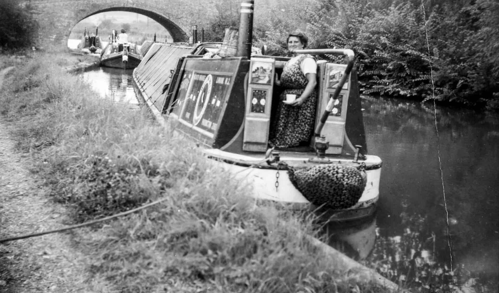 Busy canal scene, location unknown, c 1950s 