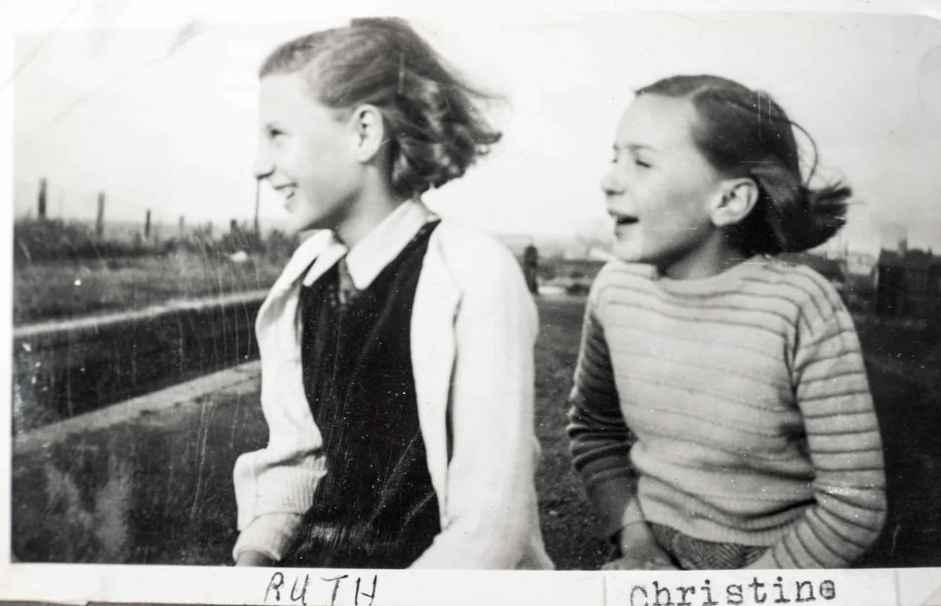 Ruth and her sister Christine sitting on Brades Hall Locks, 1949, taken by their father, Will King.