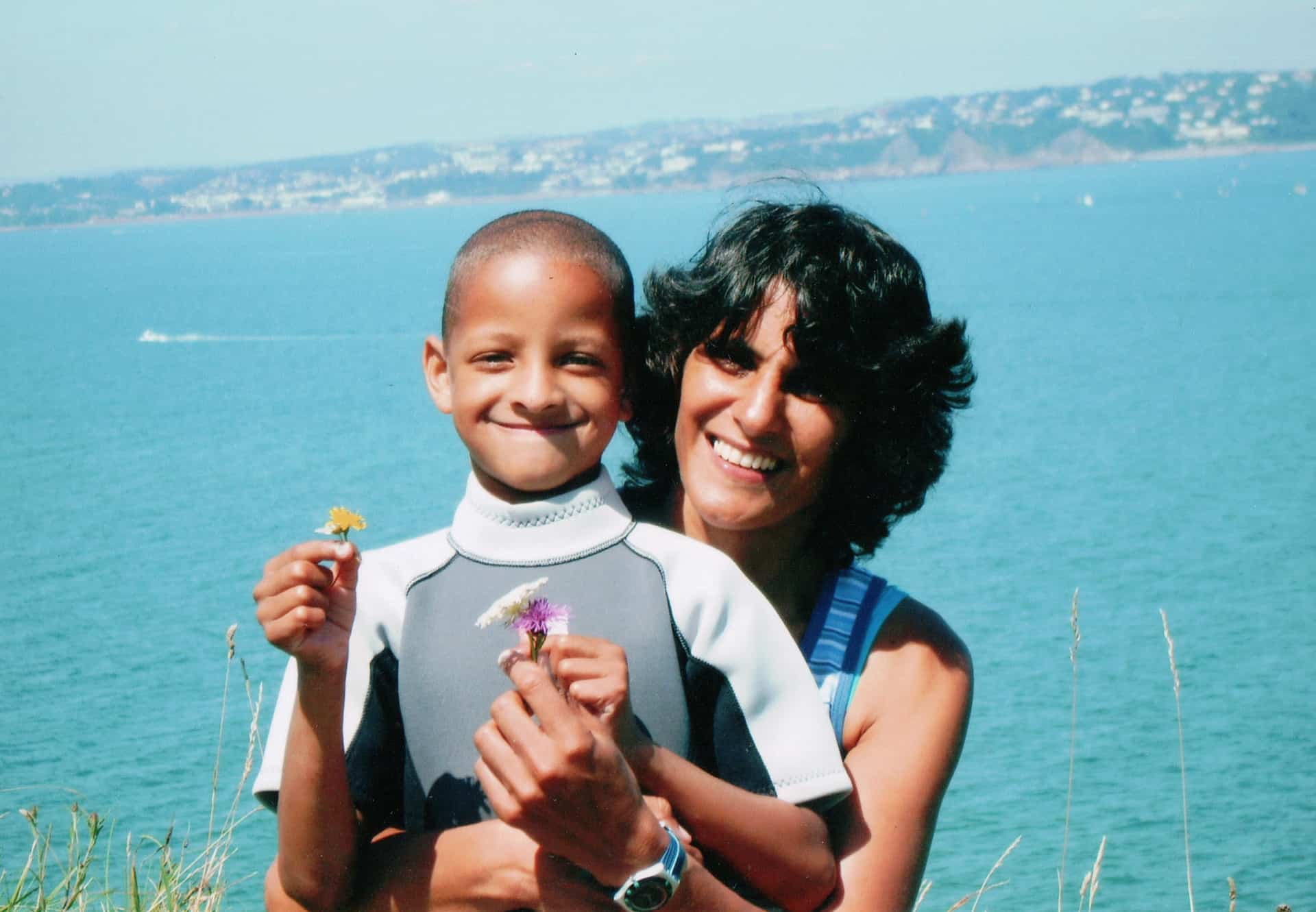 Marianne with her son Akeem on holiday in Brixham.