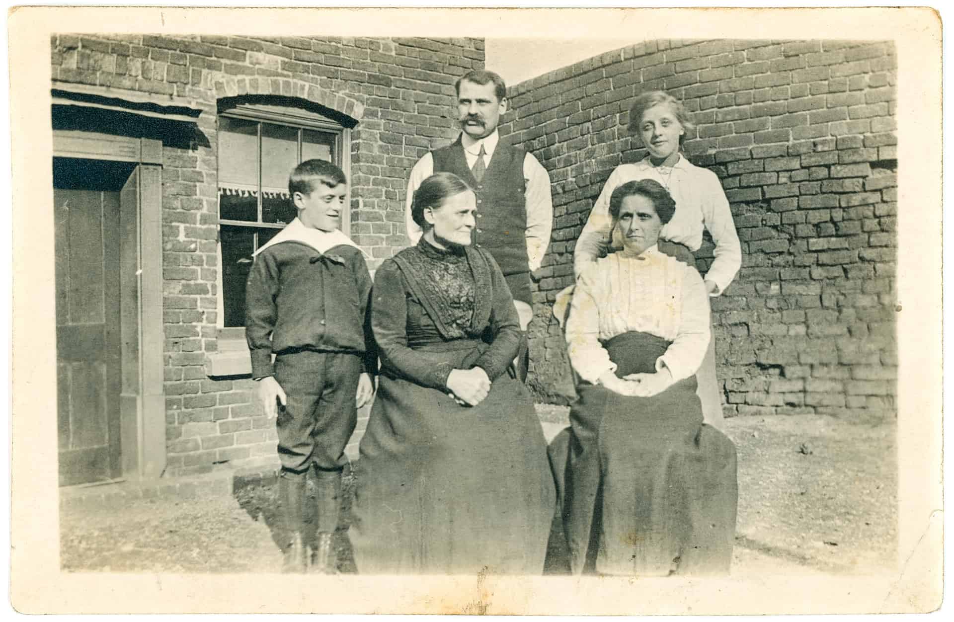 My Mother’s family at home in Burnt Tree area. Probably around the start of The Great War.
