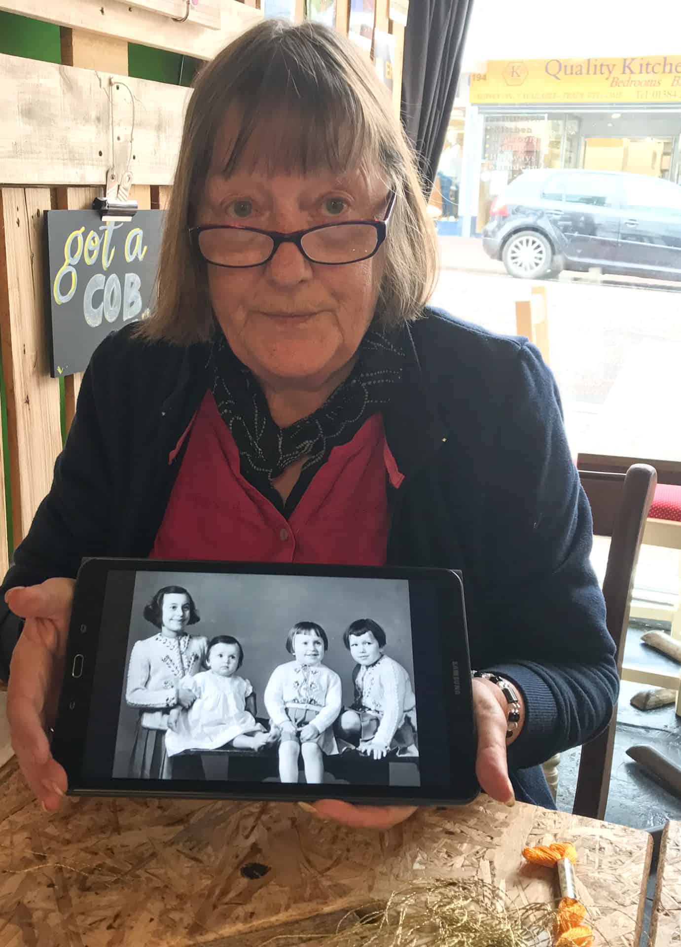 Barbara shares childhood photos at Gather café.