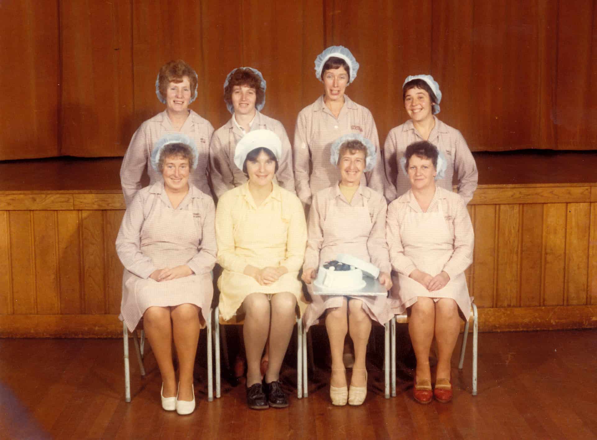 Lilian Hayes (holding the cake) on her retirement, Tividale Comprehensive School, 1979