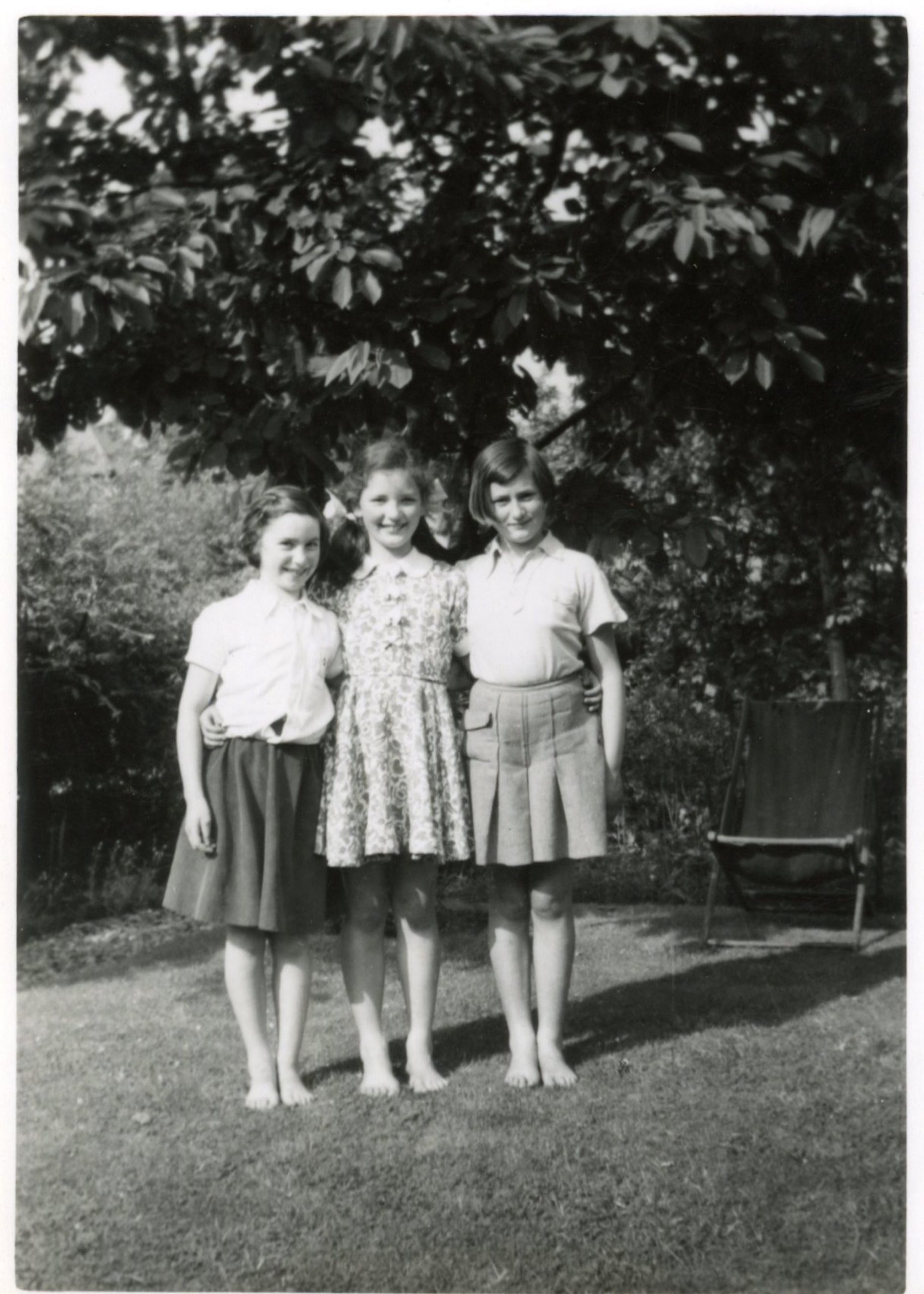 Three young girls who lived on Wells Road. Left to right: me, Monica, and Heather